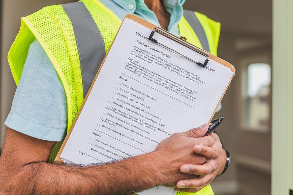 Quality inspector reviewing mill test report documentation